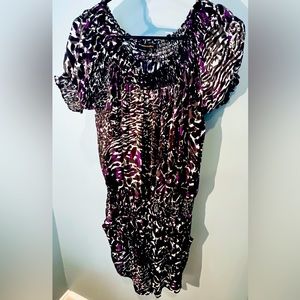 BCBGMaxazria Black and purple short romper shorts with pockets. Excellent cond